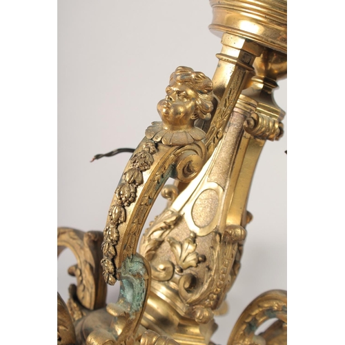 1236 - A SUPERB GILT BRONZE SIX LIGHT CHANDELIER after ANDRE CHARLES BOULLE, with masks, acanthus scrolls a... 