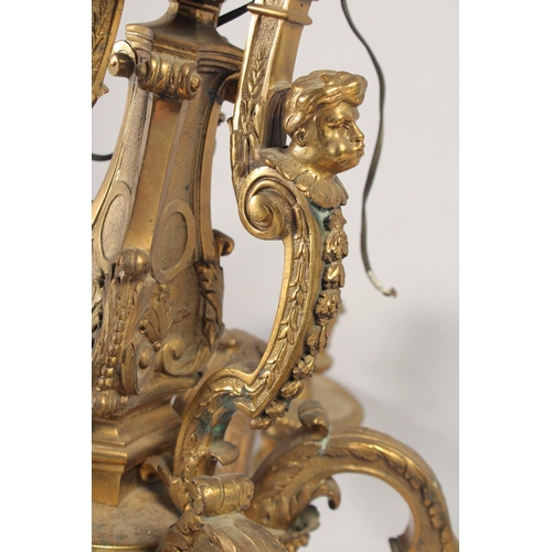 1236 - A SUPERB GILT BRONZE SIX LIGHT CHANDELIER after ANDRE CHARLES BOULLE, with masks, acanthus scrolls a... 