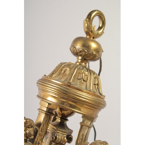 1236 - A SUPERB GILT BRONZE SIX LIGHT CHANDELIER after ANDRE CHARLES BOULLE, with masks, acanthus scrolls a... 