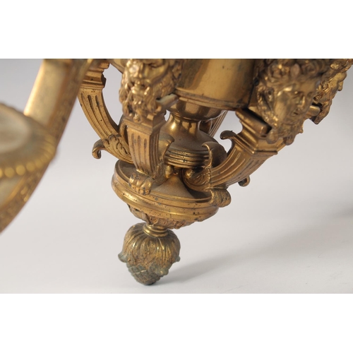 1236 - A SUPERB GILT BRONZE SIX LIGHT CHANDELIER after ANDRE CHARLES BOULLE, with masks, acanthus scrolls a... 