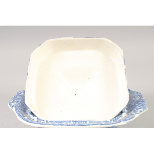 1237 - A BLUE AND WHITE SQUARE PORCELAIN TUREEN AND COVER. and a small pair of blue and white vases.