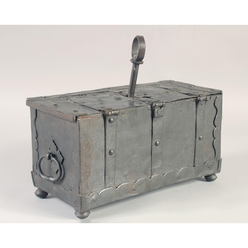 1238 - A RARE SMALL 16TH - 17TH IRON CHEST, the top opens to reveal a mechanism in the lid with iron bondin... 