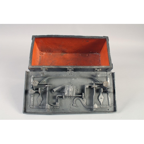 1238 - A RARE SMALL 16TH - 17TH IRON CHEST, the top opens to reveal a mechanism in the lid with iron bondin... 