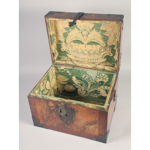 1240 - A GOOD 18TH CENTURY BRASS BOUND WALNUT BOX with iron banding and handles. 15ins wide x 12 ins deep x... 