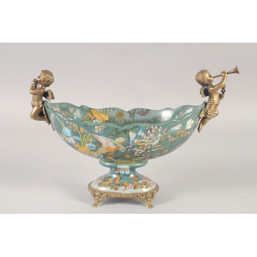 1248 - AN OVAL PORCELAIN COMPORT painted with birds and flowers with gilt cupid handles. 11ins wide.