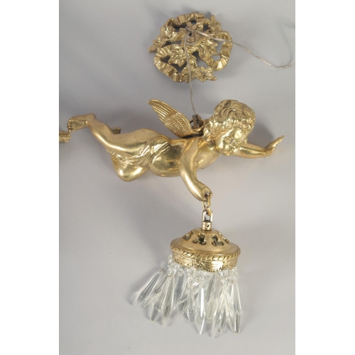 1277 - A GOOD PAIR OF GILT BRONZE CUPID WALL LIGHTS with cut glass prism drop. 12ins long.