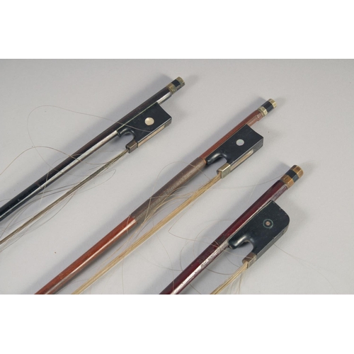 1300A - THREE CELLO BOWS. Length approx. 28 inches