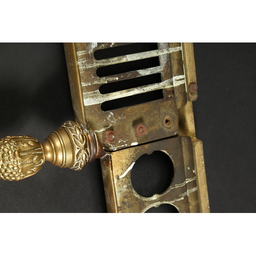 1312 - A VERY GOOD 19TH CENTURY BRASS FRENCH FENDER with pierced grill, urn finials and pineapples 4ft 7ins... 