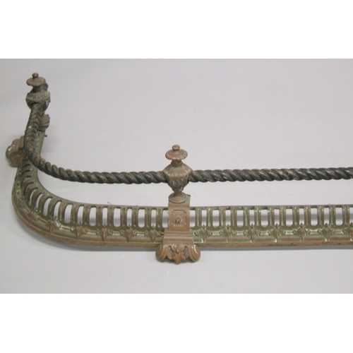 1326 - A 19TH CENTURY BRASS PIERCED FENDER with rope work. 4ft 3ins long 1ft 2ins deep.