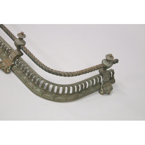 1326 - A 19TH CENTURY BRASS PIERCED FENDER with rope work. 4ft 3ins long 1ft 2ins deep.