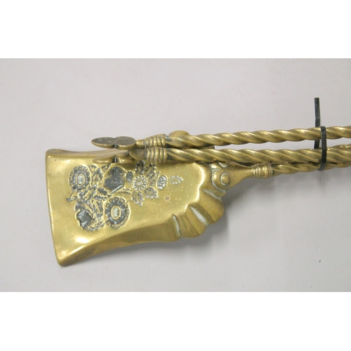 1332 - A SET OF THREE VICTORIAN BRASS FIRE IRONS.