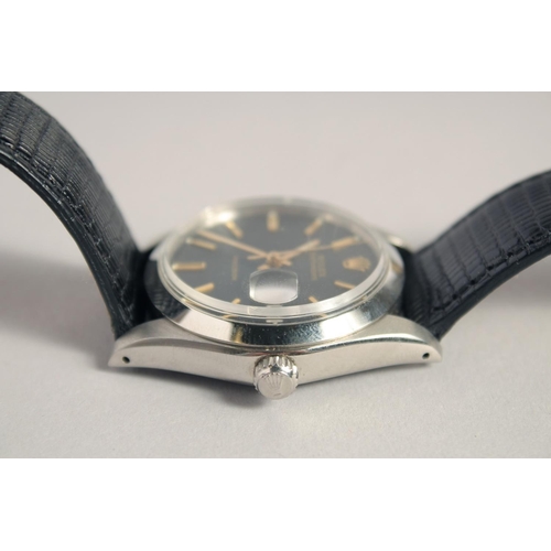 1344 - A GENTLEMAN'S ROLEX OYSTER DATE WRISTWATCH with black dial and leather strap.