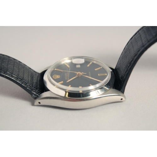 1344 - A GENTLEMAN'S ROLEX OYSTER DATE WRISTWATCH with black dial and leather strap.