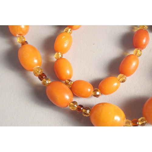 1358 - A BUTTERSCOTCH AMBER BEAD NECKLACE, twenty nine beads. Weight: 31gms, 20ins long.