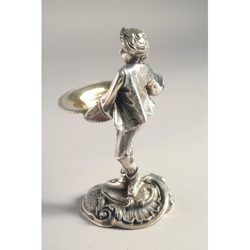 1370 - A PAIR OF SILVER PLATED YOUNG BOY AND GIRL SALTS both carrying baskets. 5.5ins high.