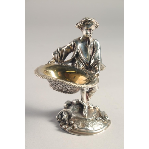 1370 - A PAIR OF SILVER PLATED YOUNG BOY AND GIRL SALTS both carrying baskets. 5.5ins high.