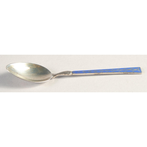 1381 - A SMALL ART NOUVEAU SILVER EGG CUP on three claw feet, blue enamel spoon. George III silver caddy sp... 