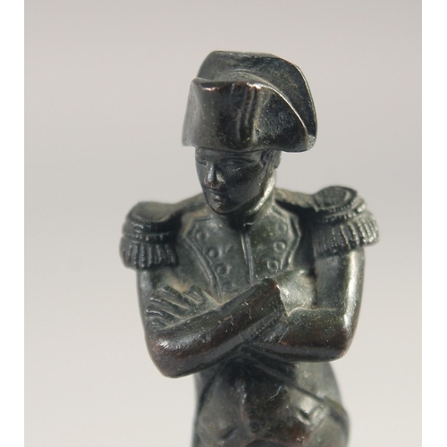 1382 - A SMALL BRONZE FIGURE OF NAPOLEON on a pedestal. 4.25ins high.