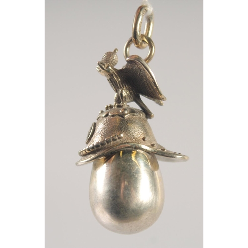 1406 - A RUSSIAN SILVER HELMET AND EGG PENDANT.