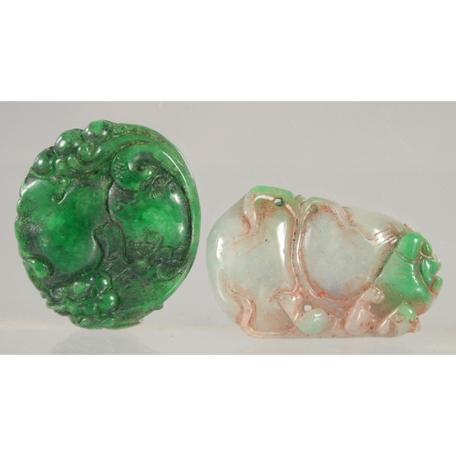 1410 - TWO CARVED JADE PENDANTS.