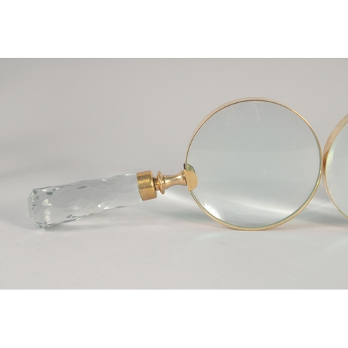 1428 - TWO MAGNIFYING GLASSES with cut glass handles.