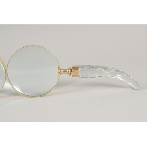 1428 - TWO MAGNIFYING GLASSES with cut glass handles.