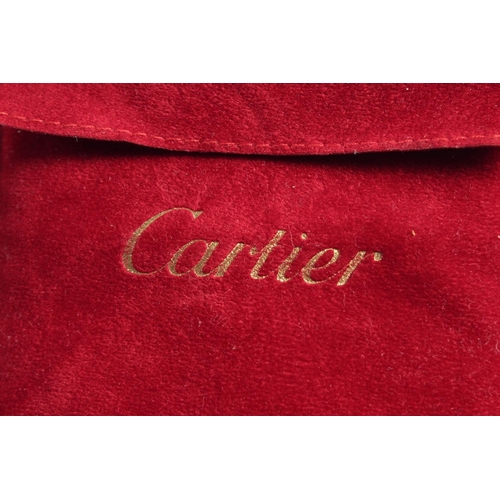 1434A - A CARTIER LEATHER WALLET in a red Cartier velvet case.