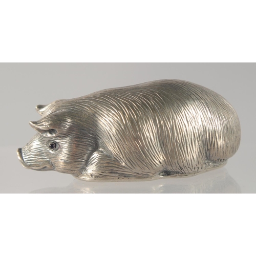 1439 - A RUSSIAN CAST SILVER MODEL OF A RECUMBENT PIG. Marks: Eagle, Head 88 I. P. Faberge. 32gms.