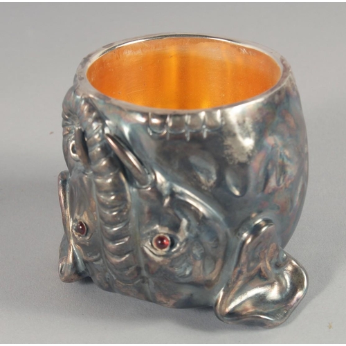 1447 - A CAST RUSSIAN SILVER AND SILVER GILT VODKA CUP, modelled as an elephant. with glass eyes Mark: Head... 