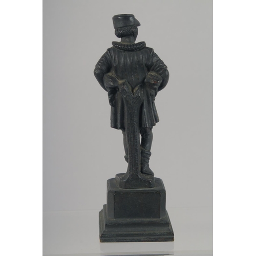 1448 - A SMALL CAST BRONZE FIGURE OF A MAN STANDING ON A PLINTH, with a goose in each arm. 15cm high.