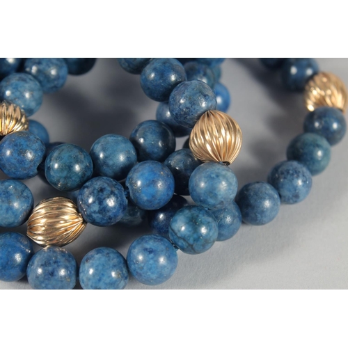 1463 - A LAPIS AND GOLD BEAD NECKLACE. 72cm long.