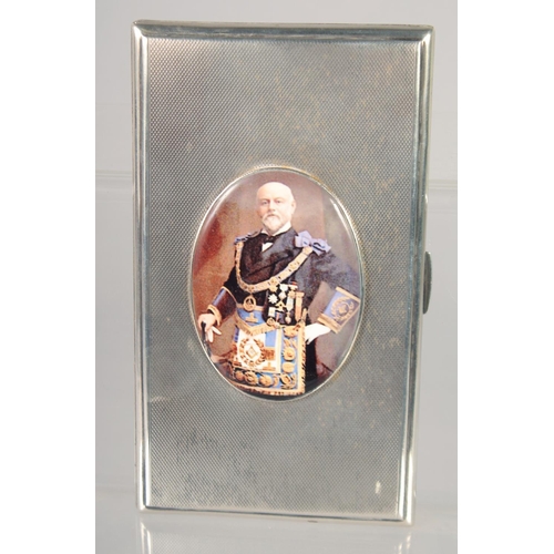 1472 - A GOOD LARGE HEAVY ENGINE TURNED CIGARETTE CASE with and oval enamel of The Masonic Grand Master. 5.... 