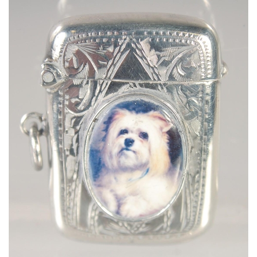 1475 - AN EDWARD VII SILVER VESTA CASE with an oval enamel of a Scottie dog. 1.5ins x.75ins Birmingham 1907... 