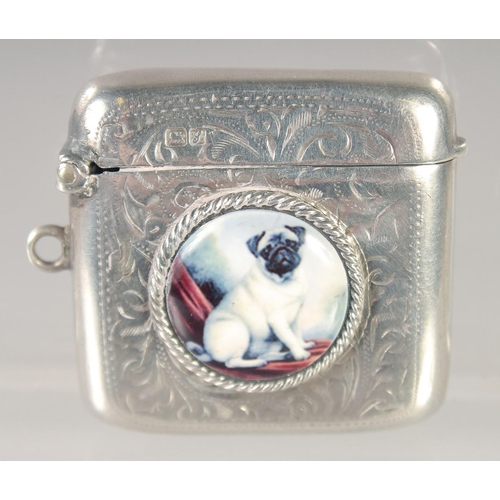 1476 - AN EDWARD VII SILVER VESTA CASE with an oval enamel of a pug dog. 1.5ins x 1.25ins. Chester 1918.... 