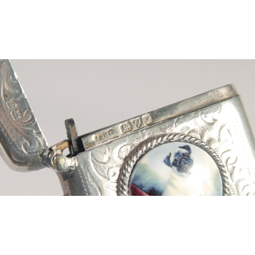 1476 - AN EDWARD VII SILVER VESTA CASE with an oval enamel of a pug dog. 1.5ins x 1.25ins. Chester 1918.... 