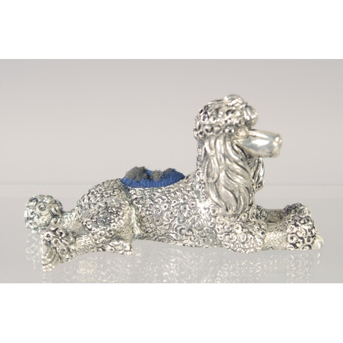 1487 - A SILVER PLATED POODLE PIN CUSHION.