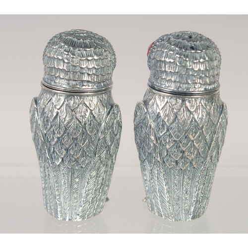 1490 - A PAIR OF 800 OWL SALT AND PEPPERS. 2.5ins high.