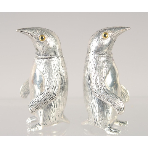 1494 - A PAIR OF 800 PENGUIN SALT AND PEPPERS. 1.5ins high.