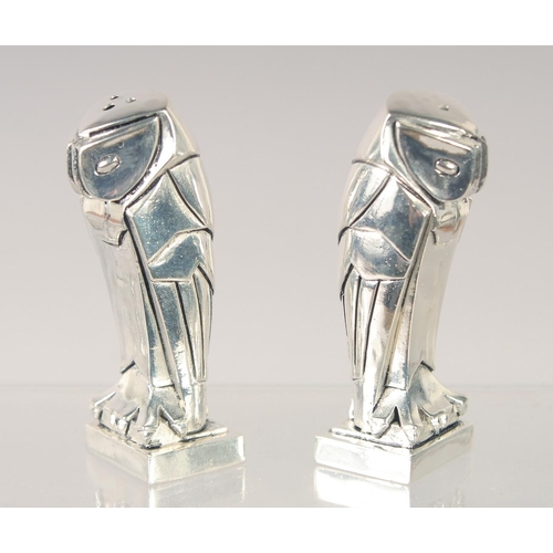 1495 - A PAIR OF 800 ART DECO STYLE OWL SALT AND PEPPERS. 2.75ins high.