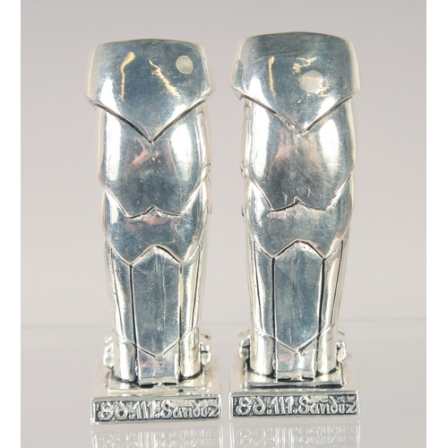 1495 - A PAIR OF 800 ART DECO STYLE OWL SALT AND PEPPERS. 2.75ins high.