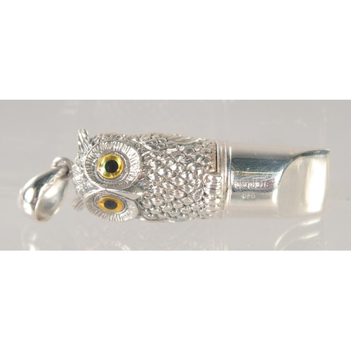 1496 - A NOVELTY SILVER OWL WHISTLE. 1.75ins