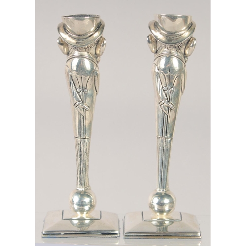 1503 - A PAIR OF SILVER PLATE JUDAICA CANDLESTICKS. 