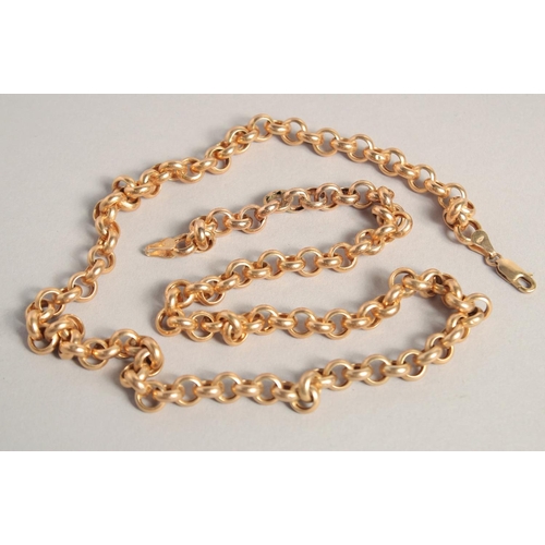 1533 - A LONG 9CT GOLD CHAIN 22ins long, 19gms.