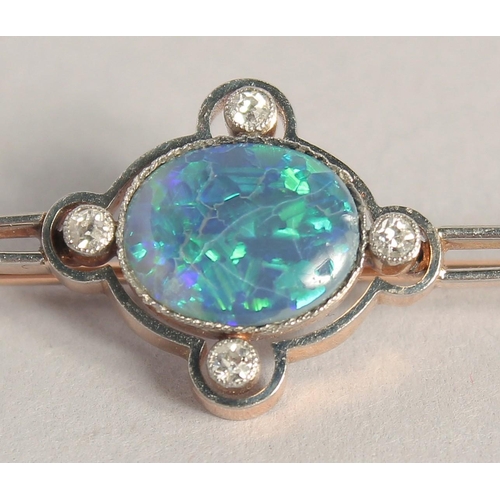 1540 - A BLACK OPAL AND DIAMOND BAR BROOCH.