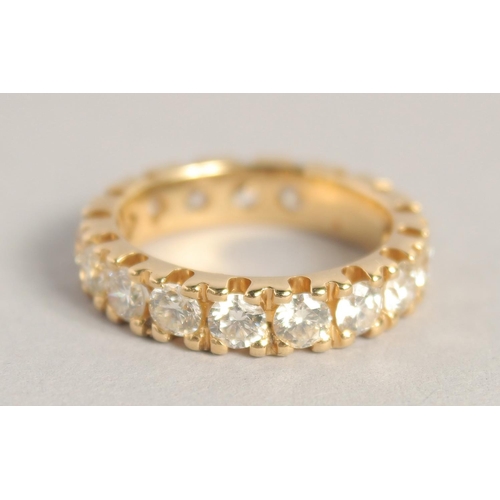 1542 - A SUPERB 18CT YELLOW GOLD DIAMOND ETERNITY RING set with 4ct diamonds of twenty stones, in an Asprey... 