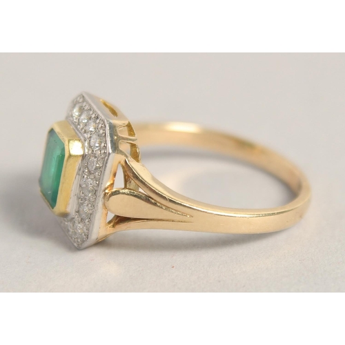 1544 - AN 18CT YELLOW GOLD COLUMBIAN EMERALD AND DIAMOND RING.