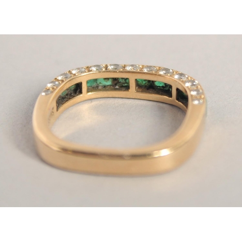 1552 - AN 18CT GOLD EMERALD AND DIAMOND THREE ROW RING.