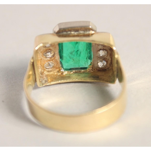 1553 - AN 18CT GOLD EMERALD AND DIAMOND RING, central Columbian emerald, 4ct, with three diamonds on each s... 