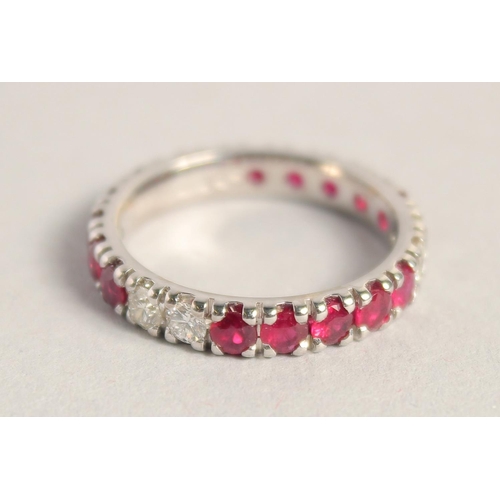 1556 - AN 18CT WHITE GOLD RUBY AND DIAMOND FULL ETERNITY RING.