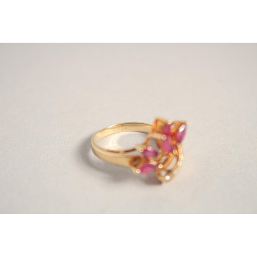 1574 - A GOLD, RUBY, AND DIAMOND RING.